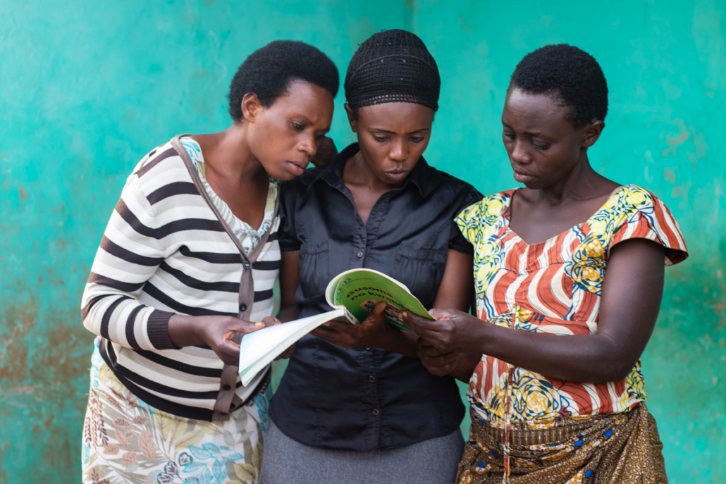 Adult Literacy Grads read together